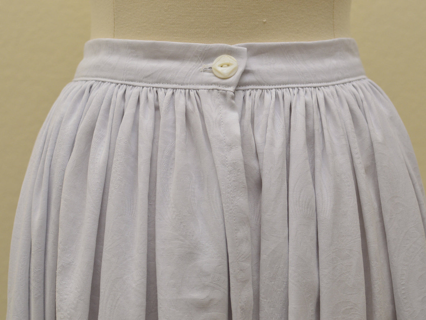 Close-up of a button waistband on a petticoat